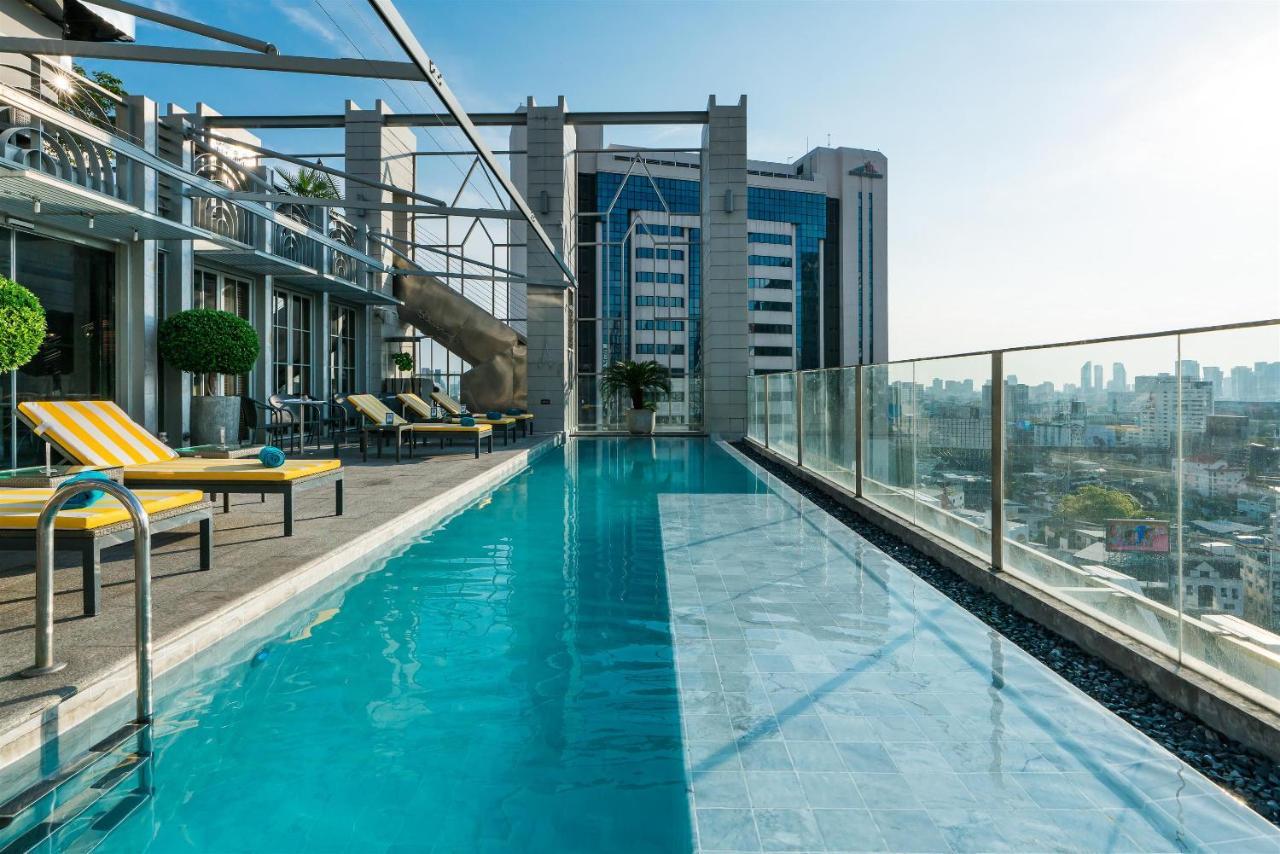 アカラ ホテル バンコク都 エクステリア 写真 Rooftop pool at the hotel